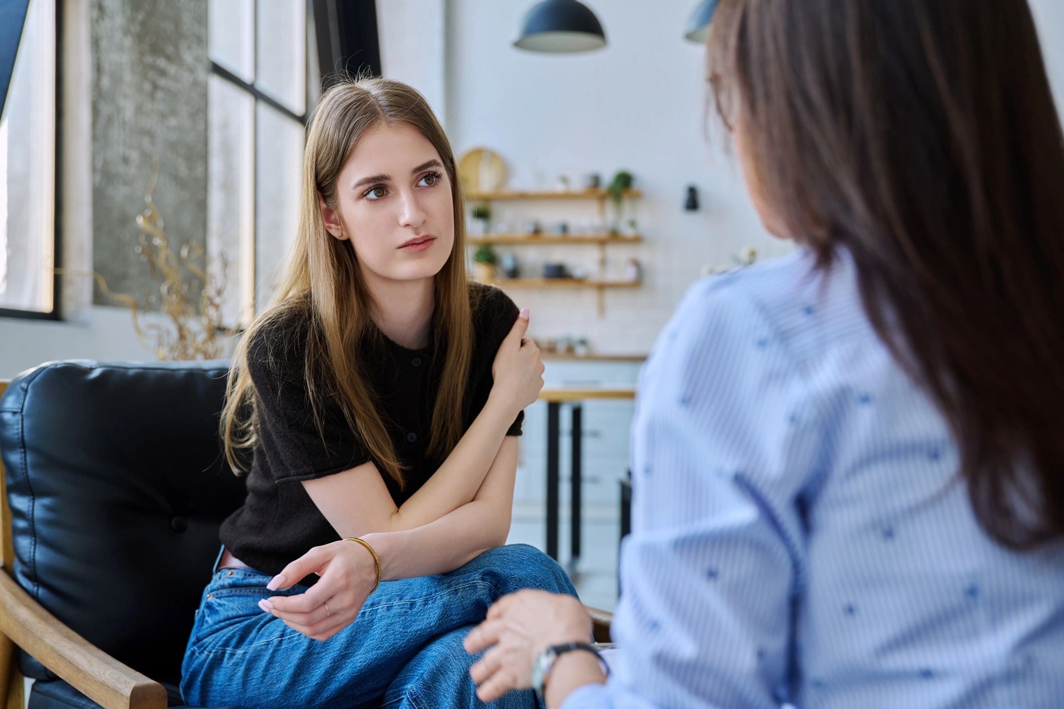 Two women having a supportive conversation